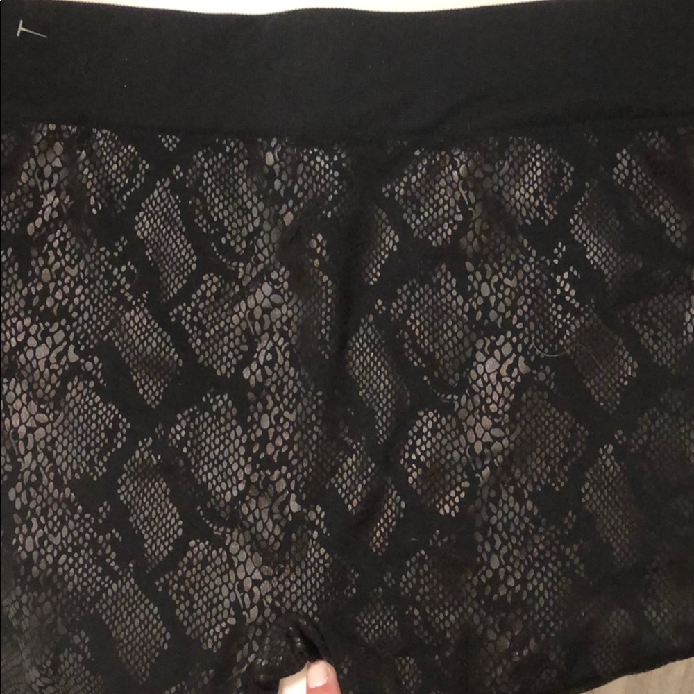 Snake skin leggings-never worn. Soft inside